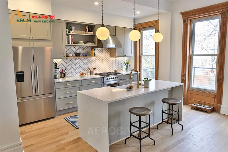 Tủ bếp chữ I màu trắng có đảo bếp mang lại không gian tinh tế cho căn bếp